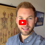 YouTube video thumbnail: man with short hair and beard in front of an anatomy skeleton poster with a red play button overlaying his face.